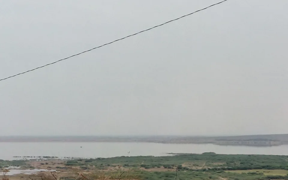 Water and shoreline at Mylavaram reservoir.